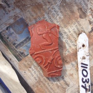 Samian ware with bow and arrow decoration